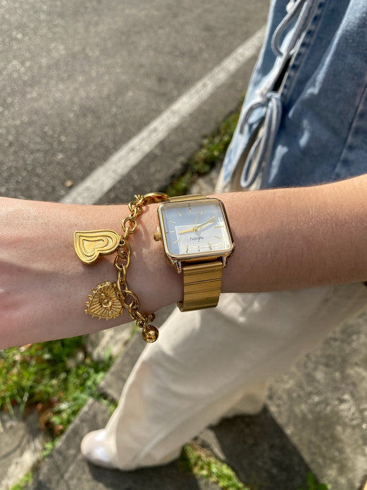 Reloj cuadrado blanco con dorado