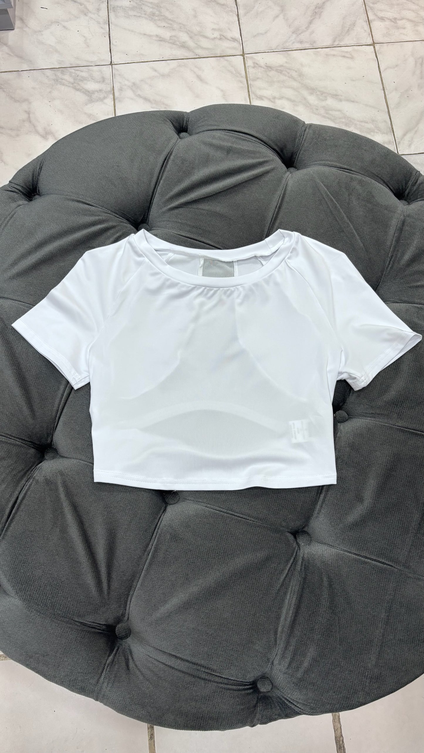 Top con transparencias en la espalda deportivo blanco