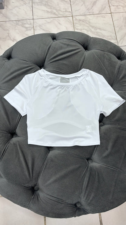 Top con transparencias en la espalda deportivo blanco