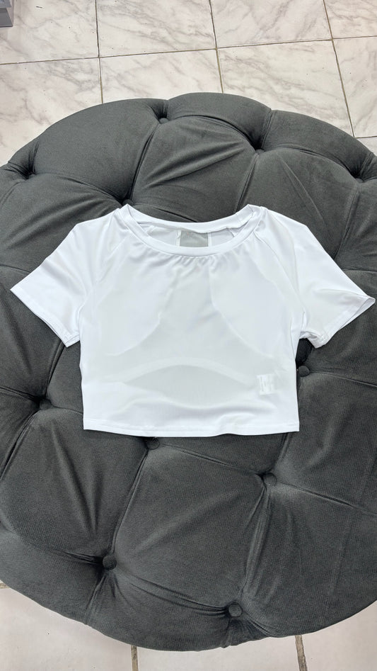 Top con transparencias en la espalda deportivo blanco