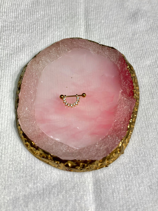 Piercing de pedrería dorado