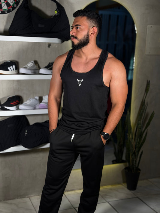 Jogger de cordón blanco con puño en la bota deportivo negro