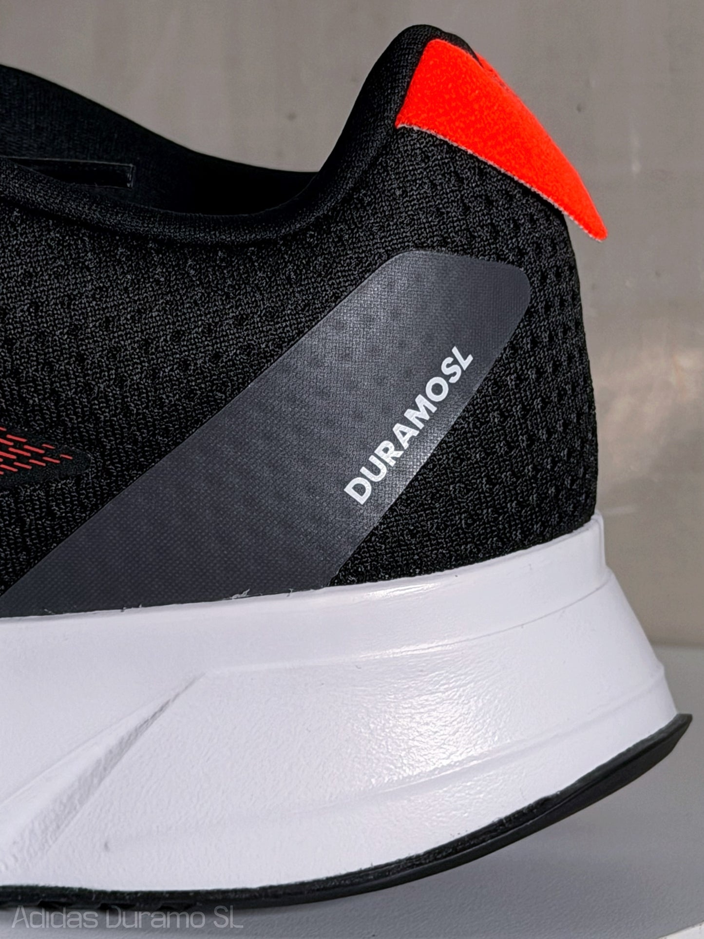 Zapatos DURAMO SL M de caballero deportivos ADIDAS negras con lineas rojas
