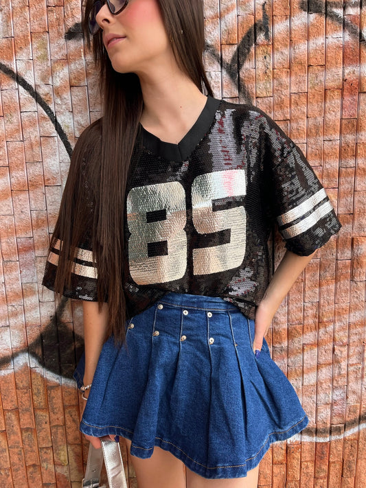 T-shirt negra de lentejuelas con estampado