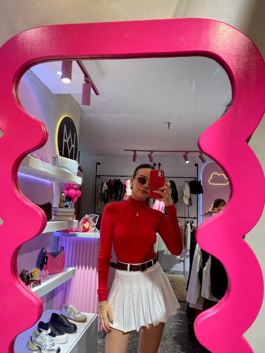 Suéter tejido manga larga tallado cuello alto