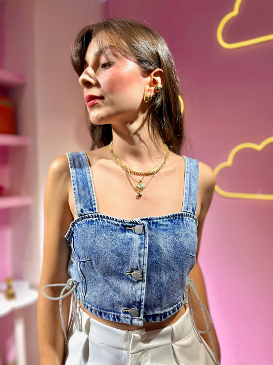 Top de jean con lazos laterales brillantes