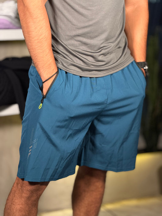 Short de cordón negro bolsillos en los cierres y detalles neón azul aquamarine