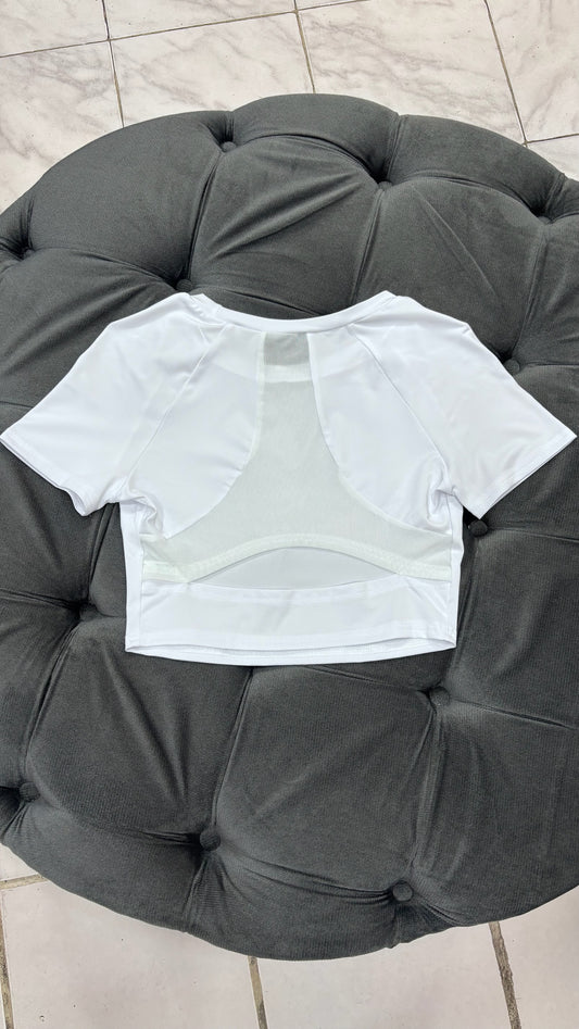 Top con transparencias en la espalda deportivo blanco