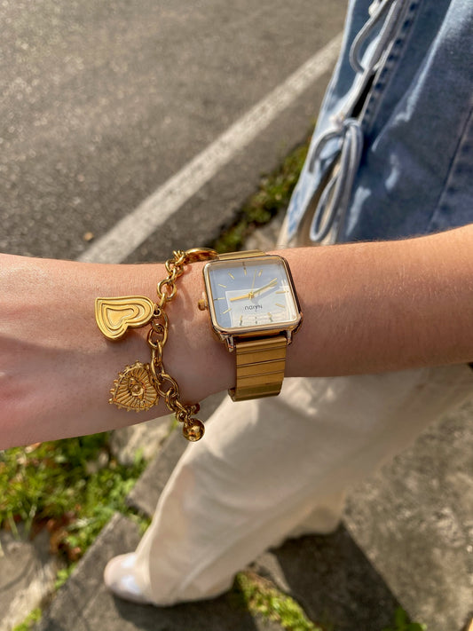 Pulsera de 5 dijes dorado, elefante, 3 corazones y perlita