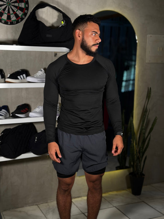 Short de cordón negro y licra debajo deportivo gris oscuro