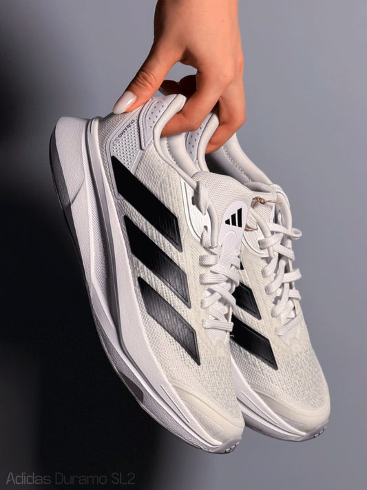 Zapato DURAMO SL2W de dama deportivas blancas con lineas negras